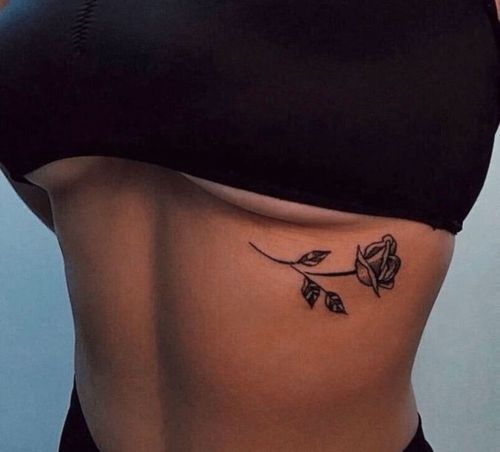 Underboob rose tattoo