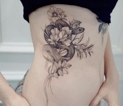 38_Breast_Tattoo_Designs