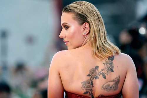 Scarlett-Johansson-Lamb-and-Flowers-Back-Tattoo