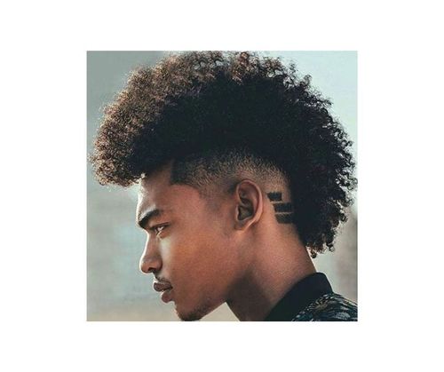 taper fade curly faux hawk