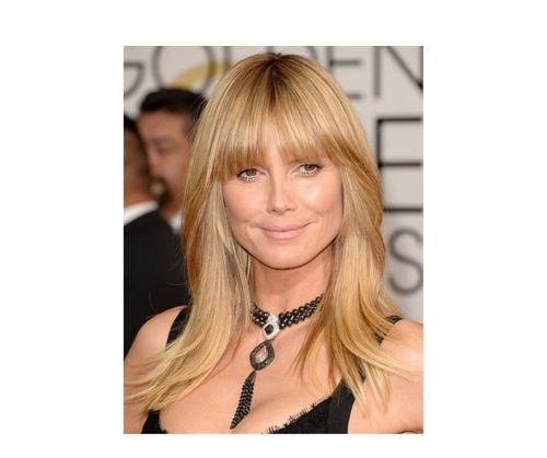 Heidi Klum | Long billowing hair with tapered sides and a natural looking  blonde color