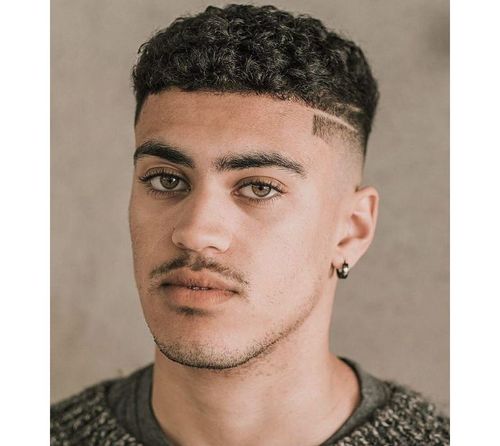 15 Trendy Men Haircuts For Naturally Curly Hair  Styleoholic