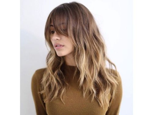 A Guide to Curtain Bangs: How to Cut and Style this Trendy Haircut | Vogue