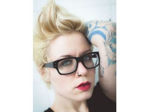 Wavy_faux_hawk_hairstyle_with_glasses_for_women_over_60