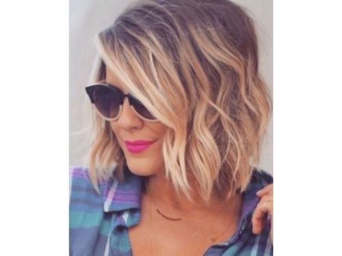 Tone_bob_hairstyle_with_glasses_for_women_over_60