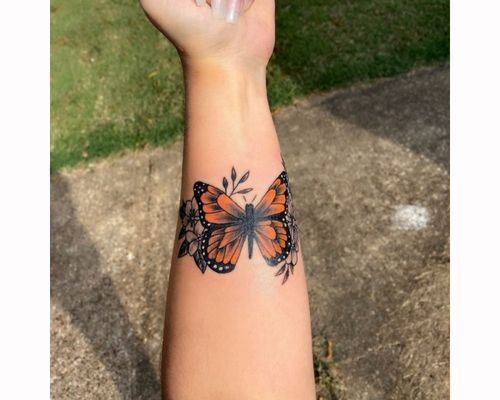 Matching butterfly couple tattoo for sisters