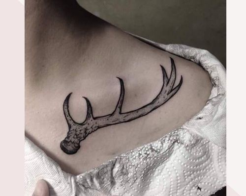 _Antlers As Women Chest Tattoo
