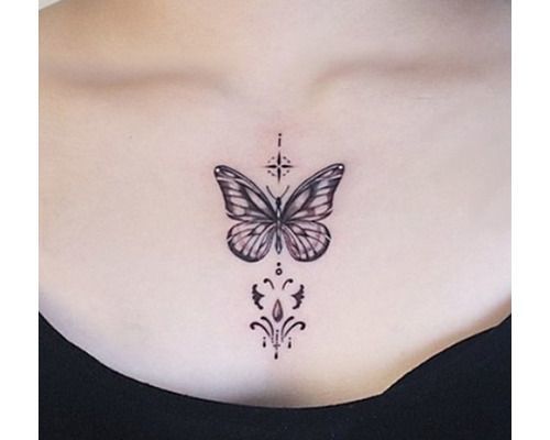 Black-butterfly-tattoo-on-the-chest (1)