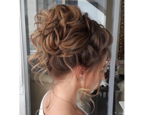 Loose Bun with Curly Strands