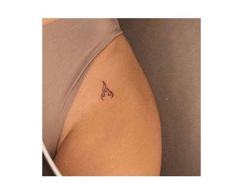 Small and charm tattoo for girl