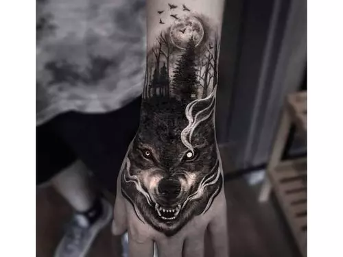 Two wolf pups with sun and moon markings on their heads geometric tattoo