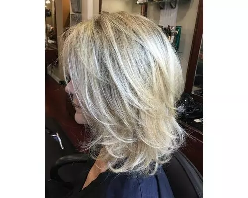 28 Blonde Feathered Medium Length Bob