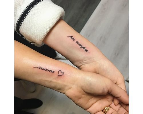 Minimalist mother and daughter matching tattoo