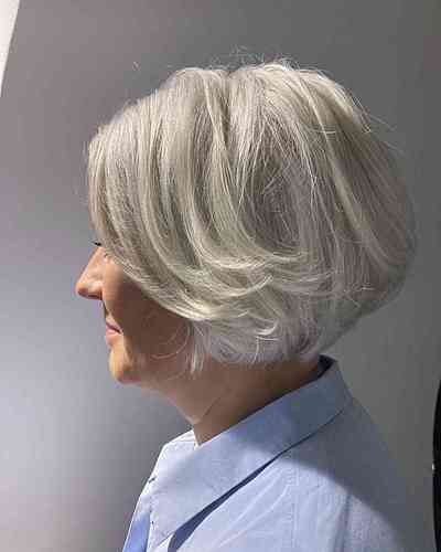 jaw-length-fluffy-white-bob-with-feathered-layers-on-older-ladies-over-60