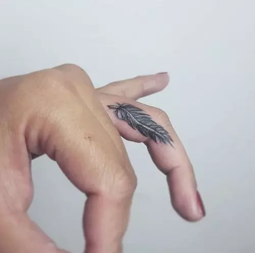 small-feather-finger-tattoos-women-designs-ink-art