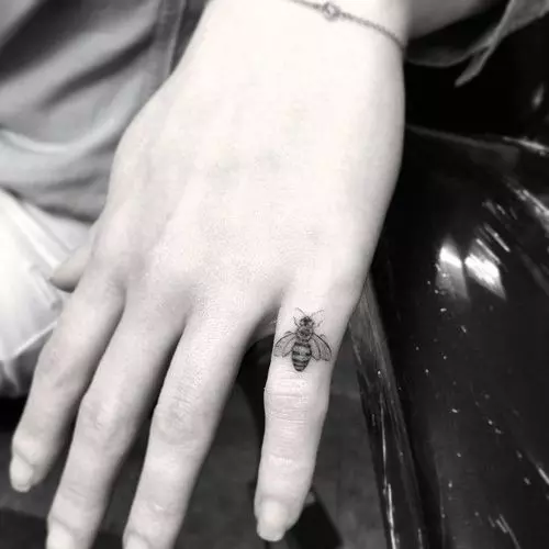 Tiny-Bee-Tattoo-on-Finger-Dr-Woo