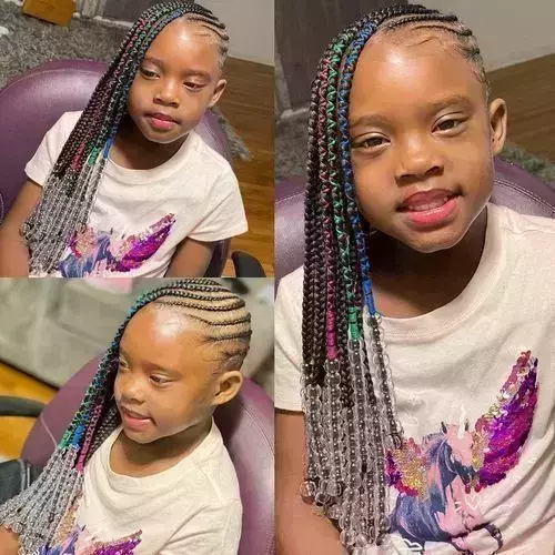 Little girl deals hairstyle with beads