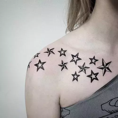 Starry-grouping-female-shoulder-tattoo-with-a-cluster-of-stars