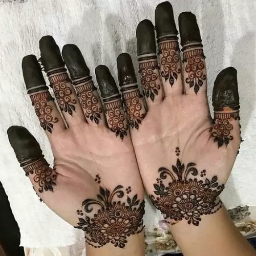 Flower mehndi design with open spaces 