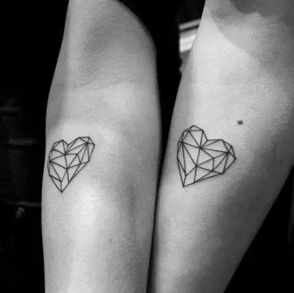 matching-couple-tattoo-small-hooks-in-shape-of-heart