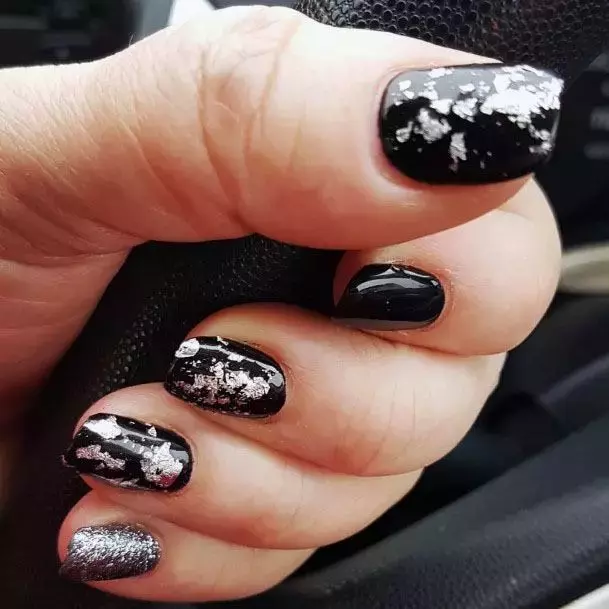 silver-foil-art-on-black-nails-women