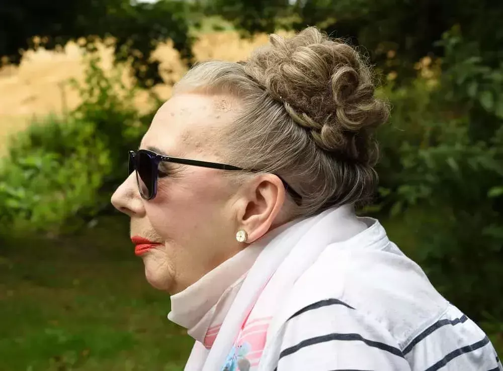 over-50-woman-with-curly-bun