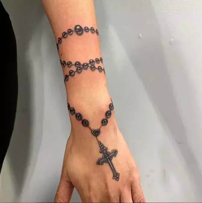 Bracelet cross...#handtattoo #tattoocross #bracelettattoo #shadingtattoo  #letsINKKK #KINGTattoostudio🤟🤟🤟👑👑💉💉 | By KING Tattoo StudioFacebook