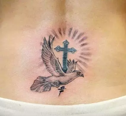 cross-and-dove-tattoo-on-lowerback