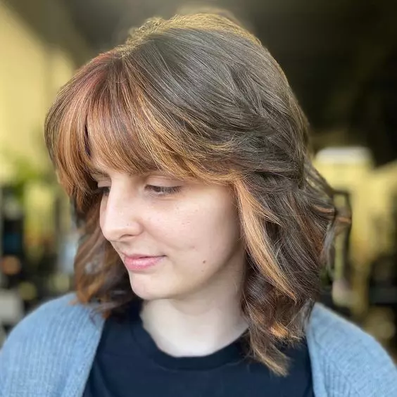 Short Butterfly Cut With Bangs and Highligjts