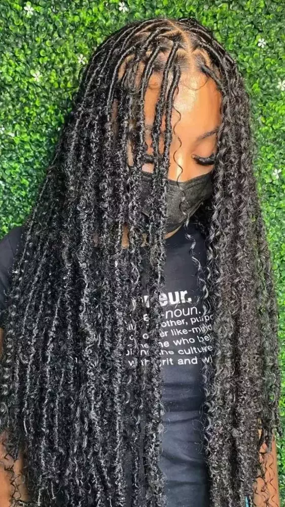 Long Butterfly locs with loose curls