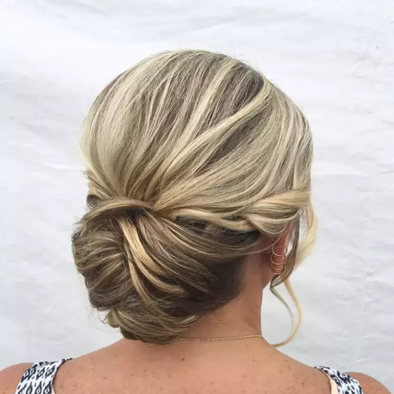 textured-low-bun-mother-of-the-grooms-hairstyle