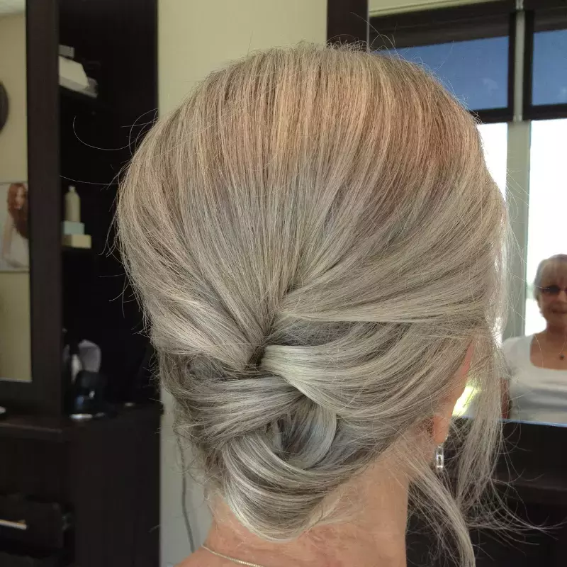 classic-bun-with-twist-mother-of-the-grooms-hairstyle