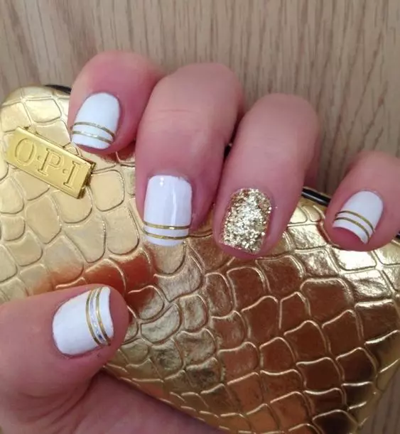white-and-gold-striped-nails