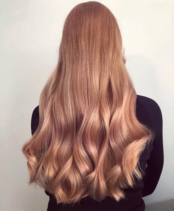long strawberry blonde with waves