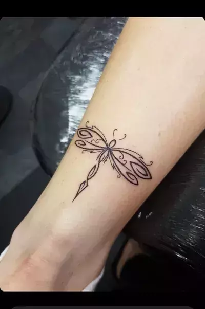 tribal-dragonfly-tattoos