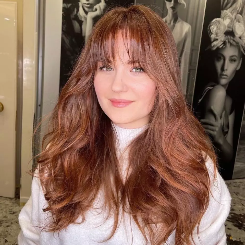 long-layered-hair-with-arched-bangs