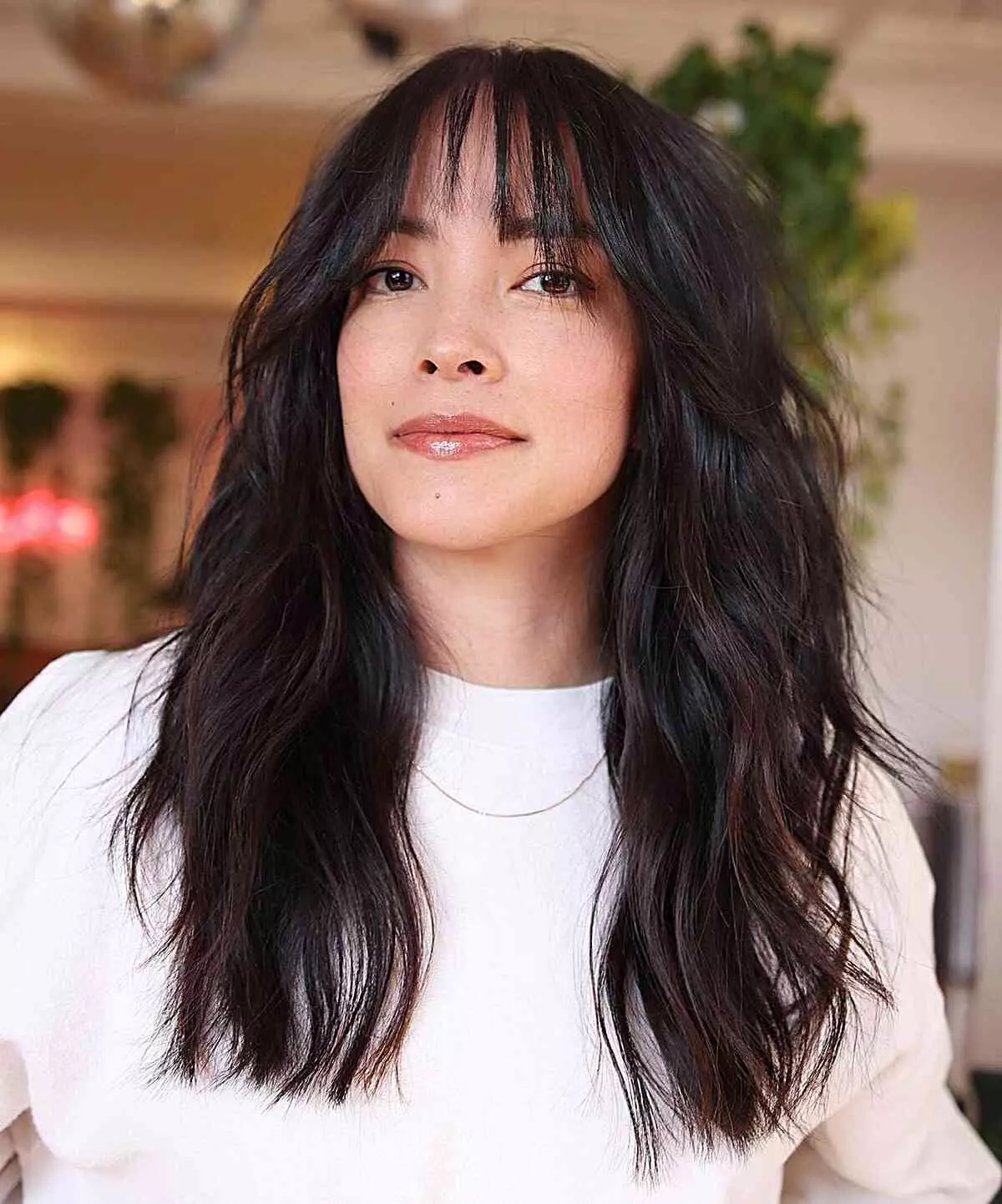 long-wavy-layers-with-piece-y-bangs