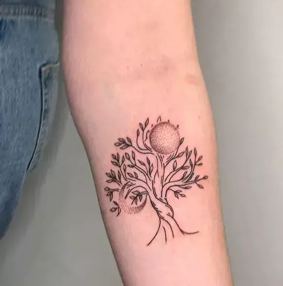 Sun-and-moon-tree-of-life-tattoo-by-@meganbelltatto