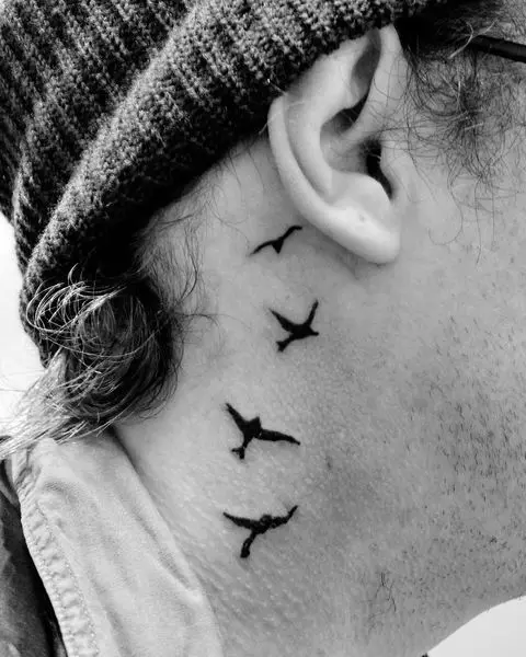 neck-tattoo-flying-birds