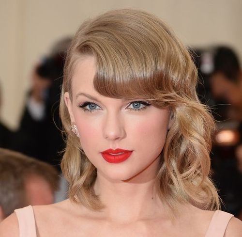 Taylor Swift full fringe hair style