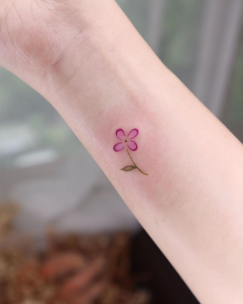 a small purple flower Thank you for accepting first tattoo