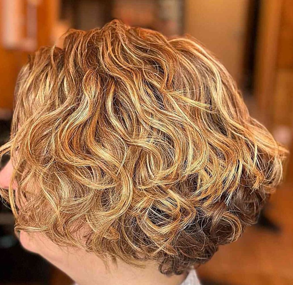 curly-blonde-bob-with-graduation-for-older-women