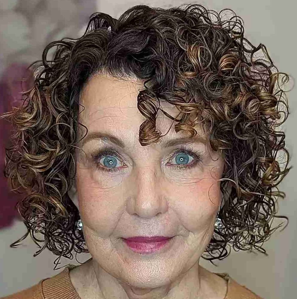 chin-length-curly-cut-with-side-bangs-on-60-year-old-ladies