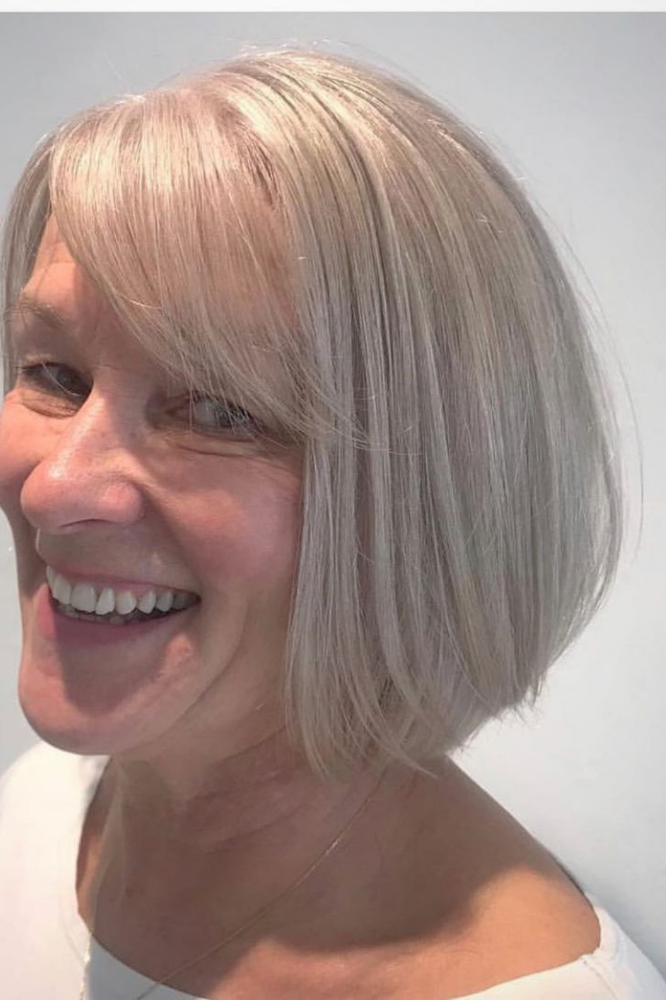 Tapered Bob And swept fringe