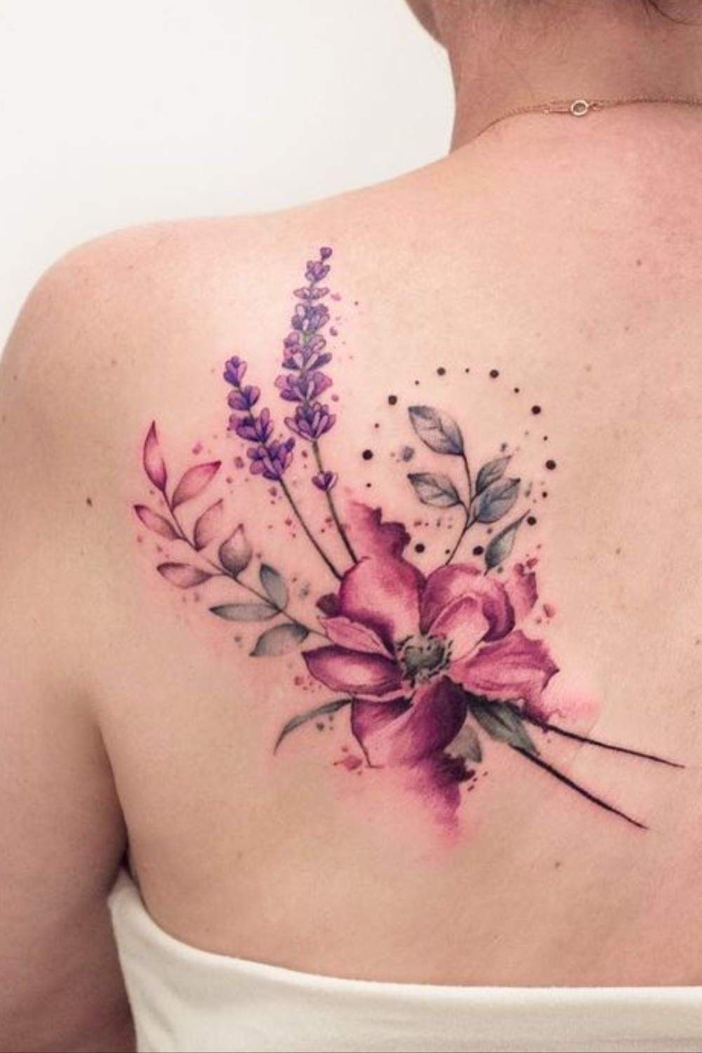 watercolor flower tattoos on the back