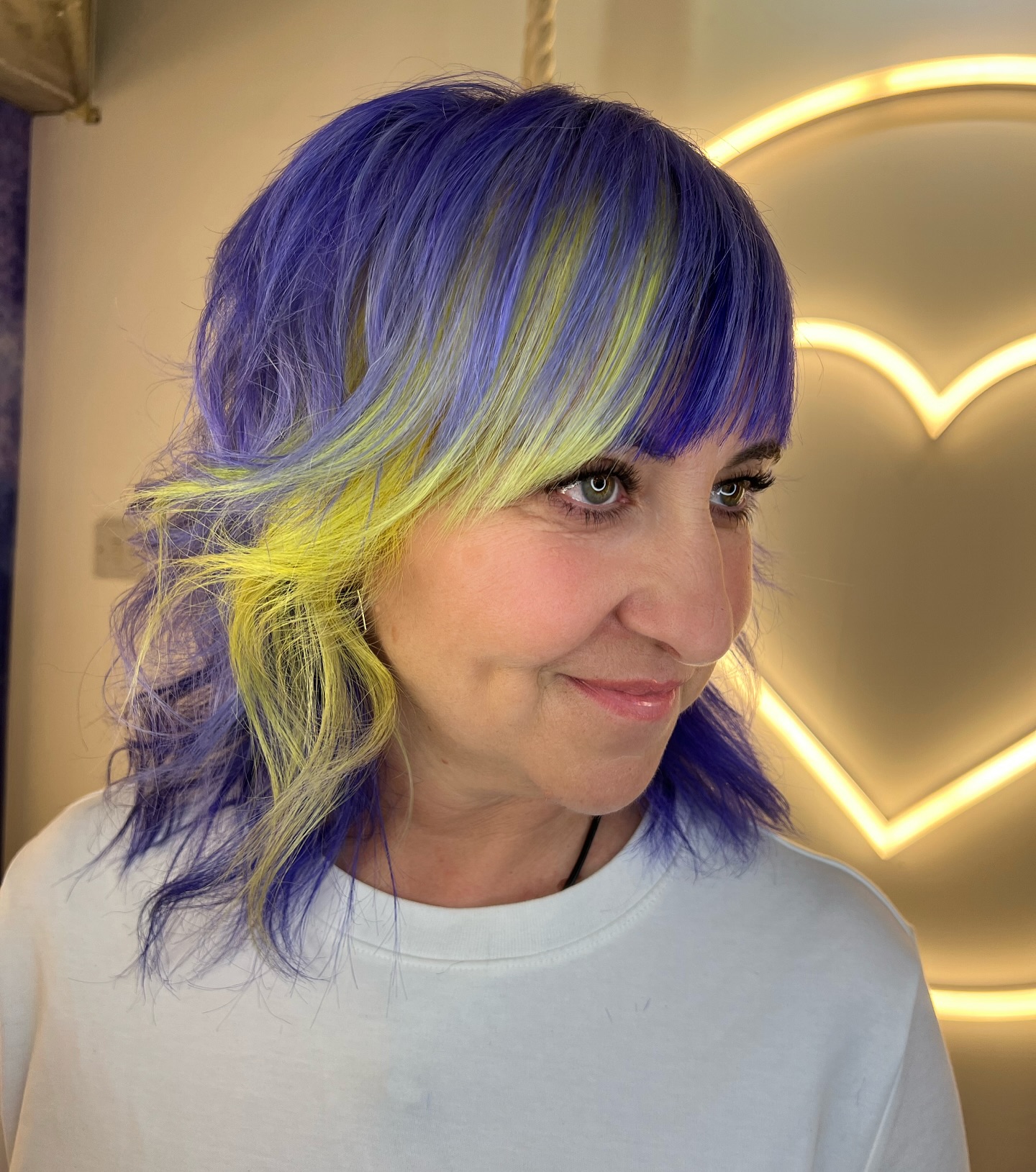 purple-and-yellow-shaggy-cut-for-older-women