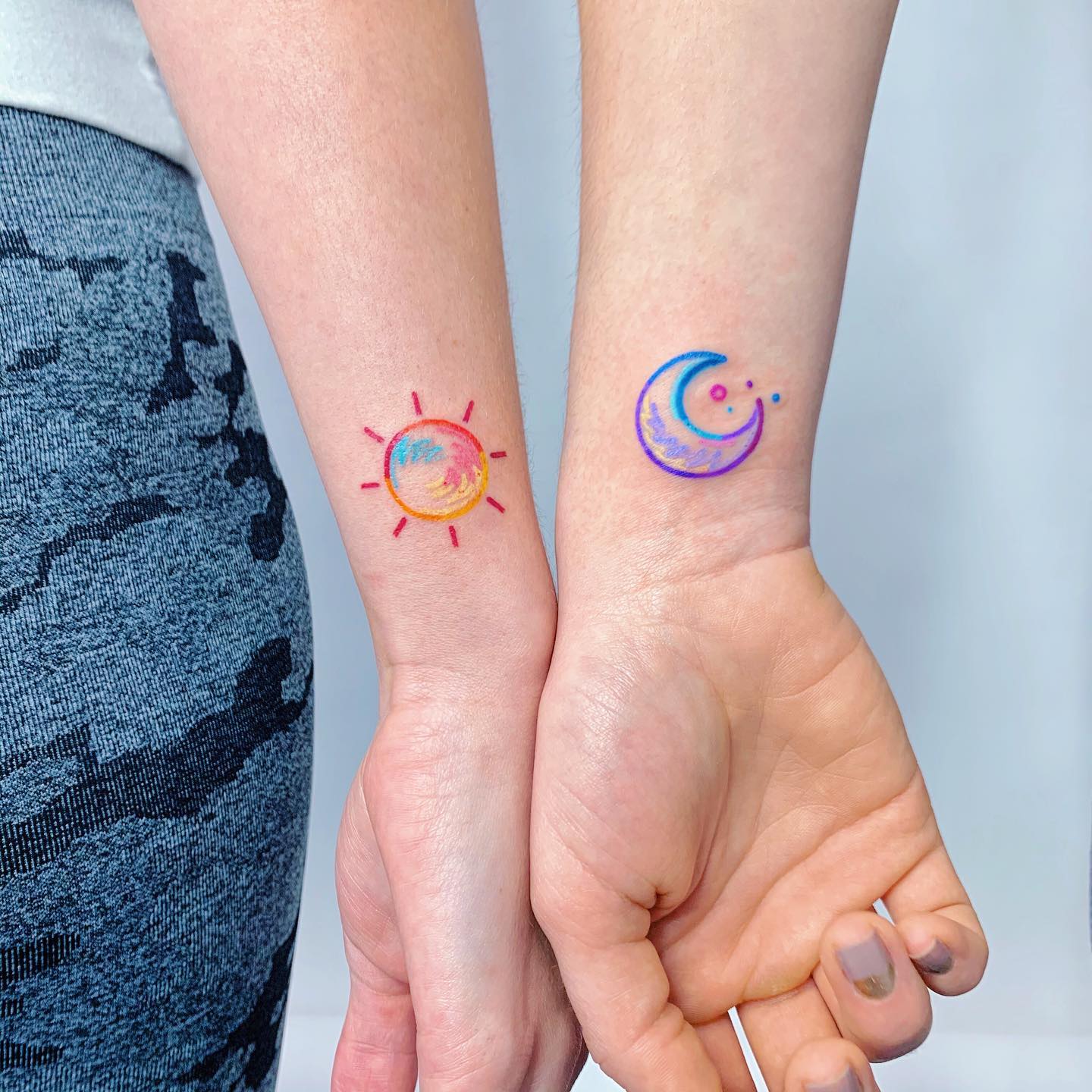 sun-and-moon-colorful-tattoo