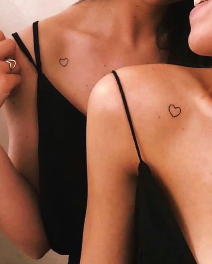 heart-small-fine-line-tattoo-on-shoulders