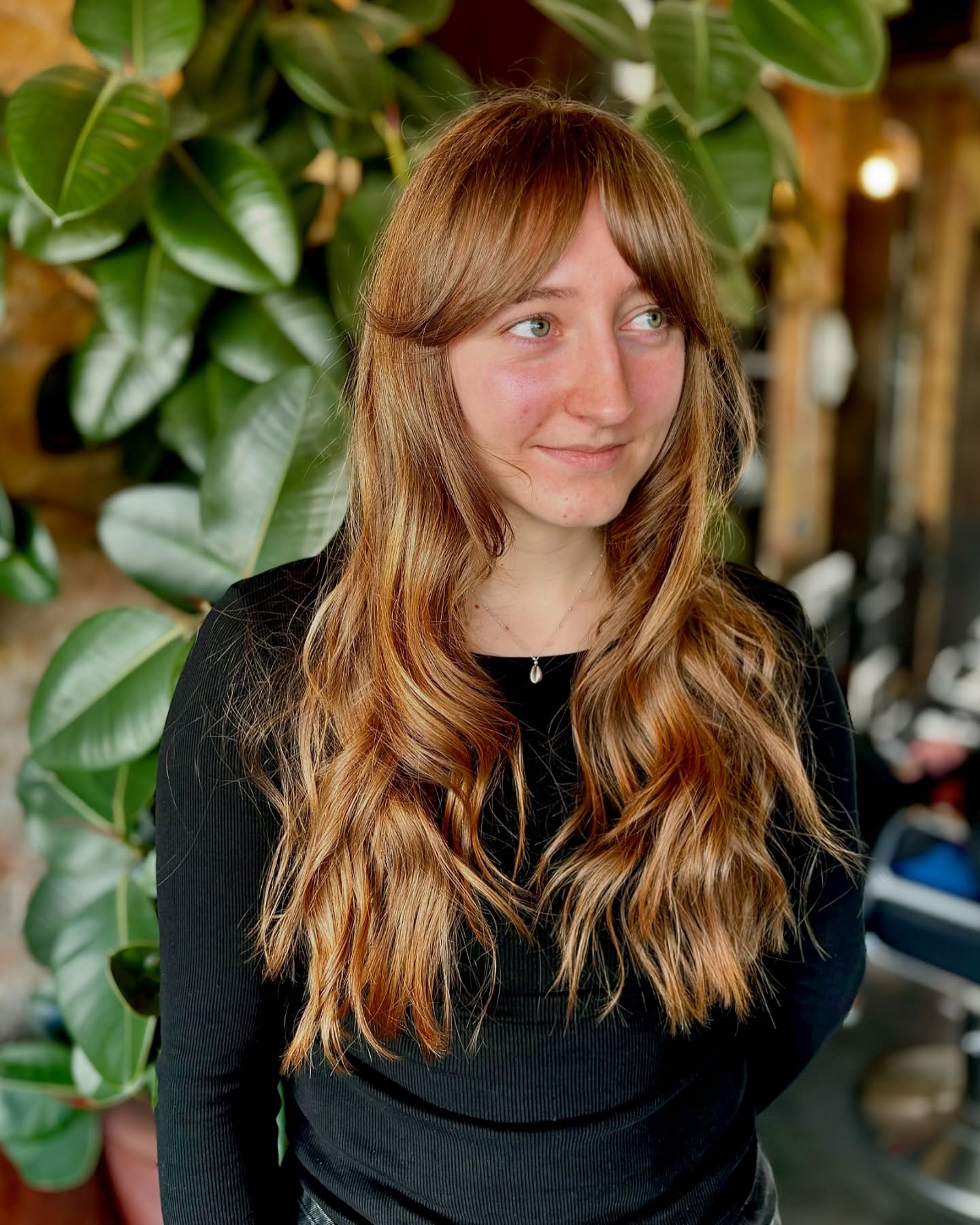 copper-hair-colored-long-hairstyle-with-bangs