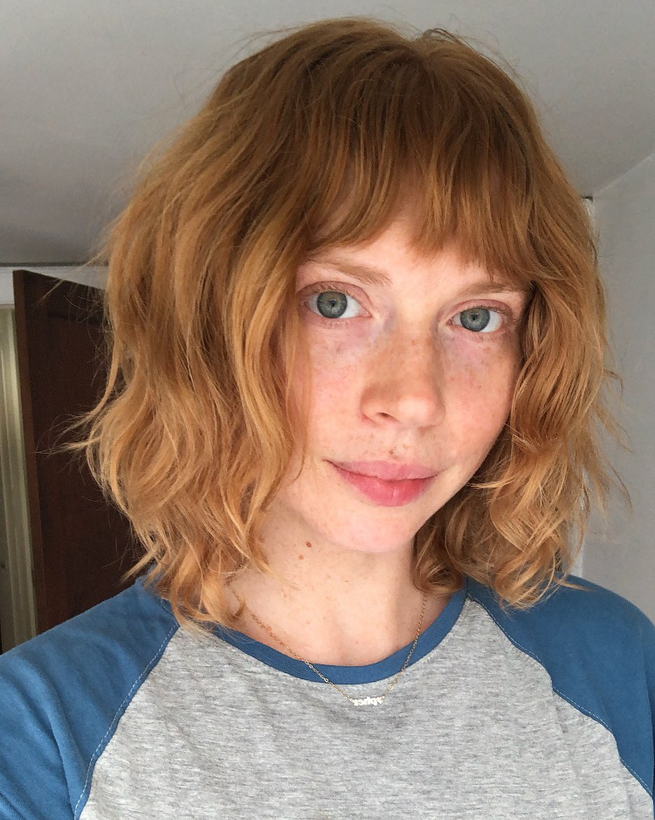 short-shaggy-cut-with-bangs-for-light-brown-hair